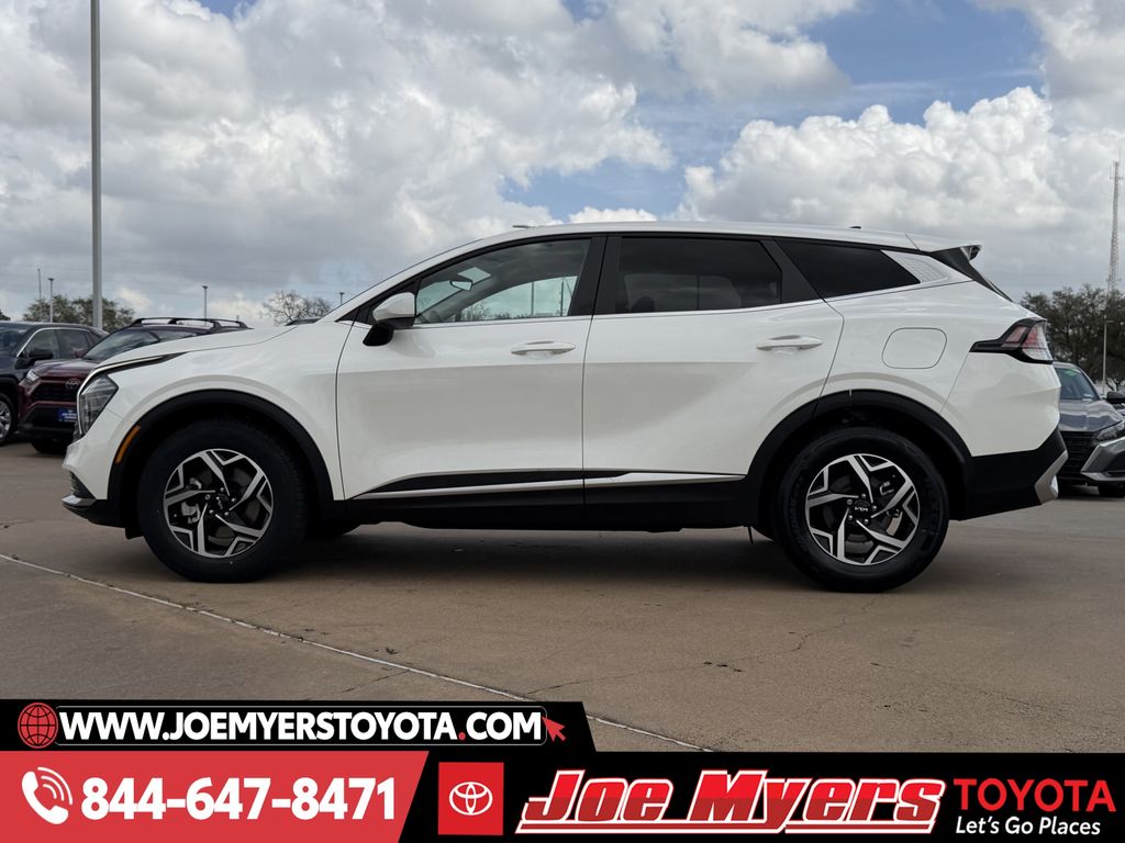 Used 2025 Snow White Pearl Kia LX image 6