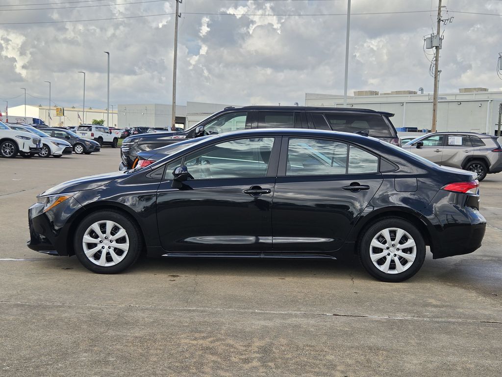 Used 2025 Midnight Black Metallic Toyota LE image 6