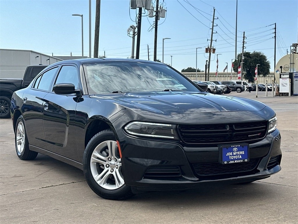 Used 2022 Dodge Charger SXT with VIN 2C3CDXBG5NH207737 for sale in Houston, TX