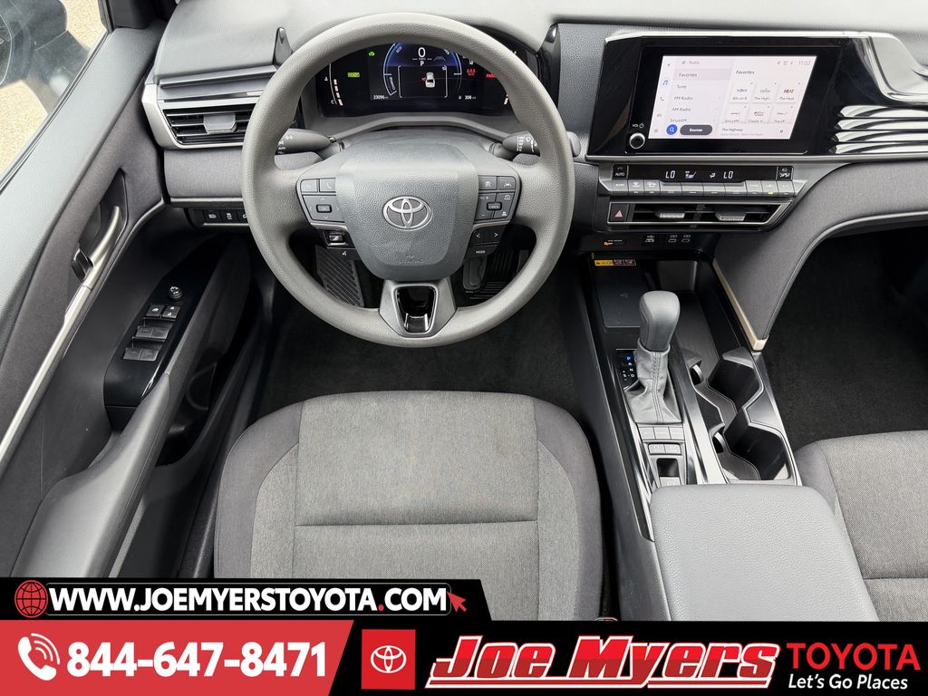 Used 2025 Reservoir Blue Toyota LE image 14