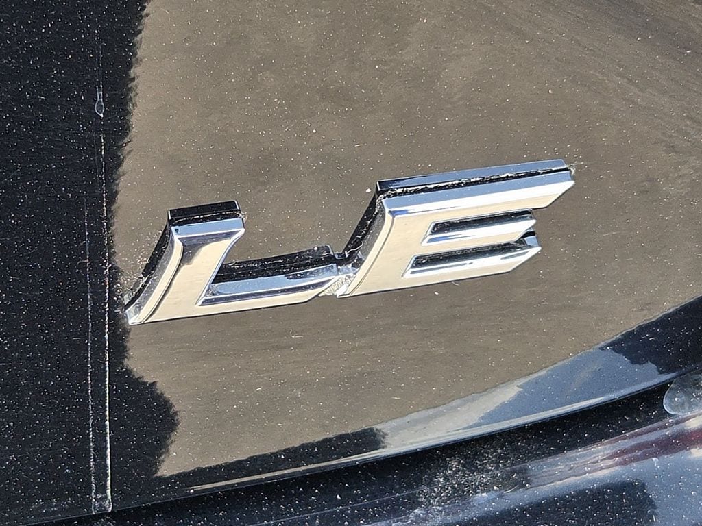 Used 2025 Midnight Black Metallic Toyota LE image 11