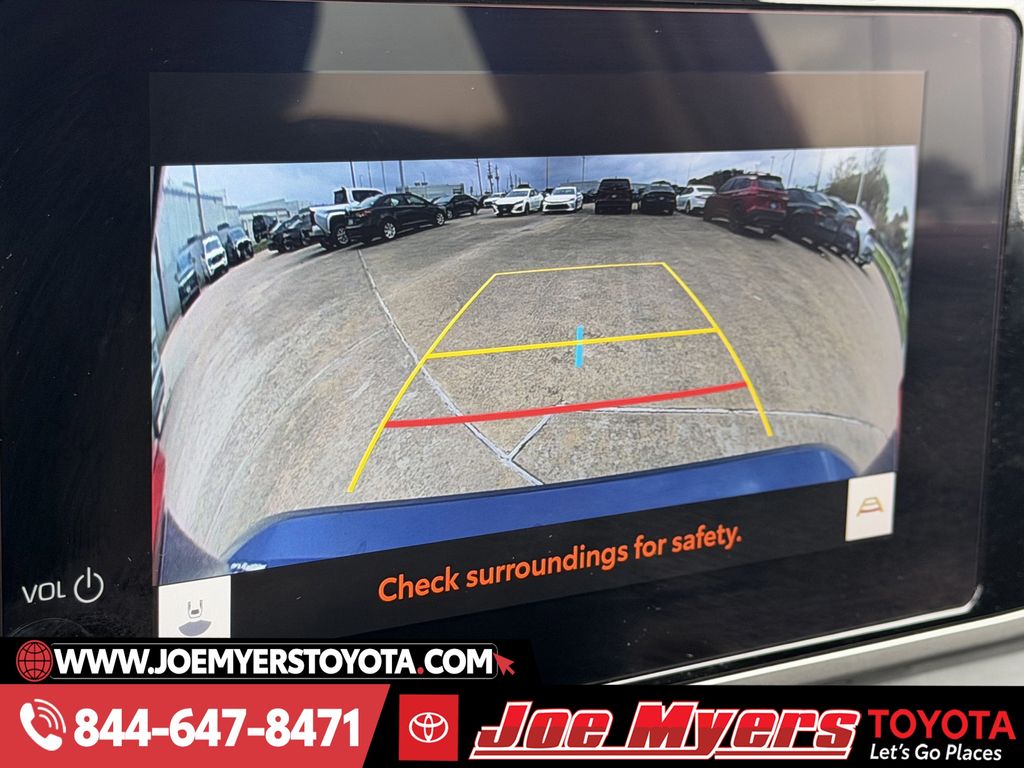 Used 2025 Reservoir Blue Toyota LE image 19