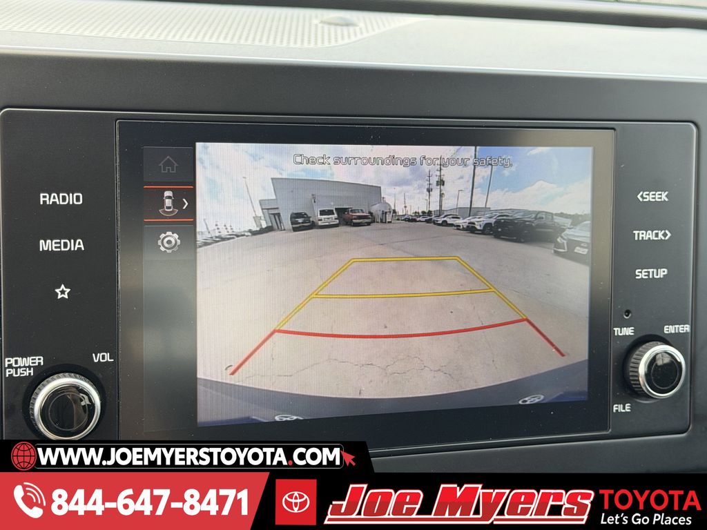 Used 2025 Snow White Pearl Kia LX image 18