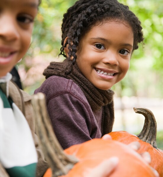 Kids with pumpkins