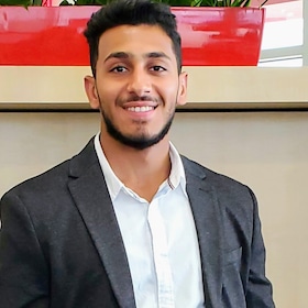 Staff member Pierre Mansour from ID_e9f3a8f4ef33