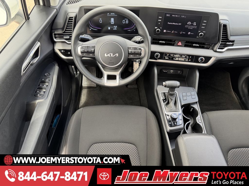 Used 2025 Snow White Pearl Kia LX image 13