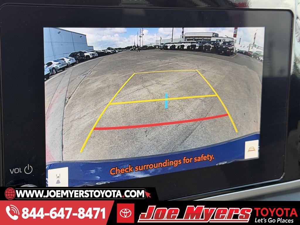 Used 2025 Reservoir Blue Toyota LE image 19