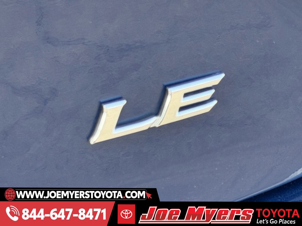 Used 2025 Reservoir Blue Toyota LE image 11