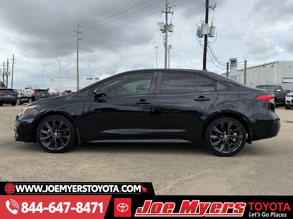 Used 2023 Midnight Black Metallic Toyota SE image 6