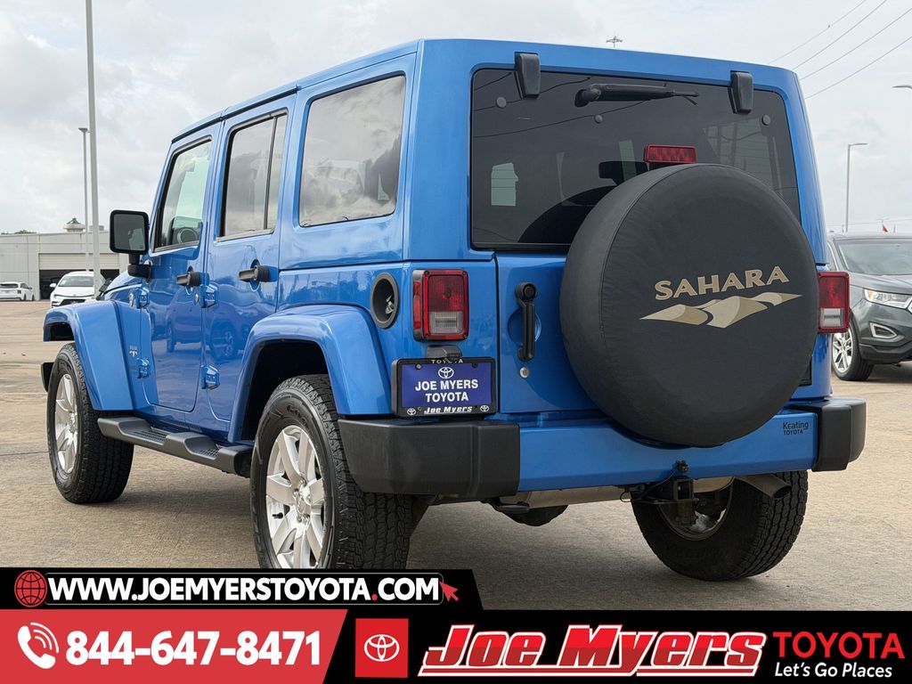Used 2016 Hydro Blue Pearl Coat Jeep Unlimited Sahara image 7