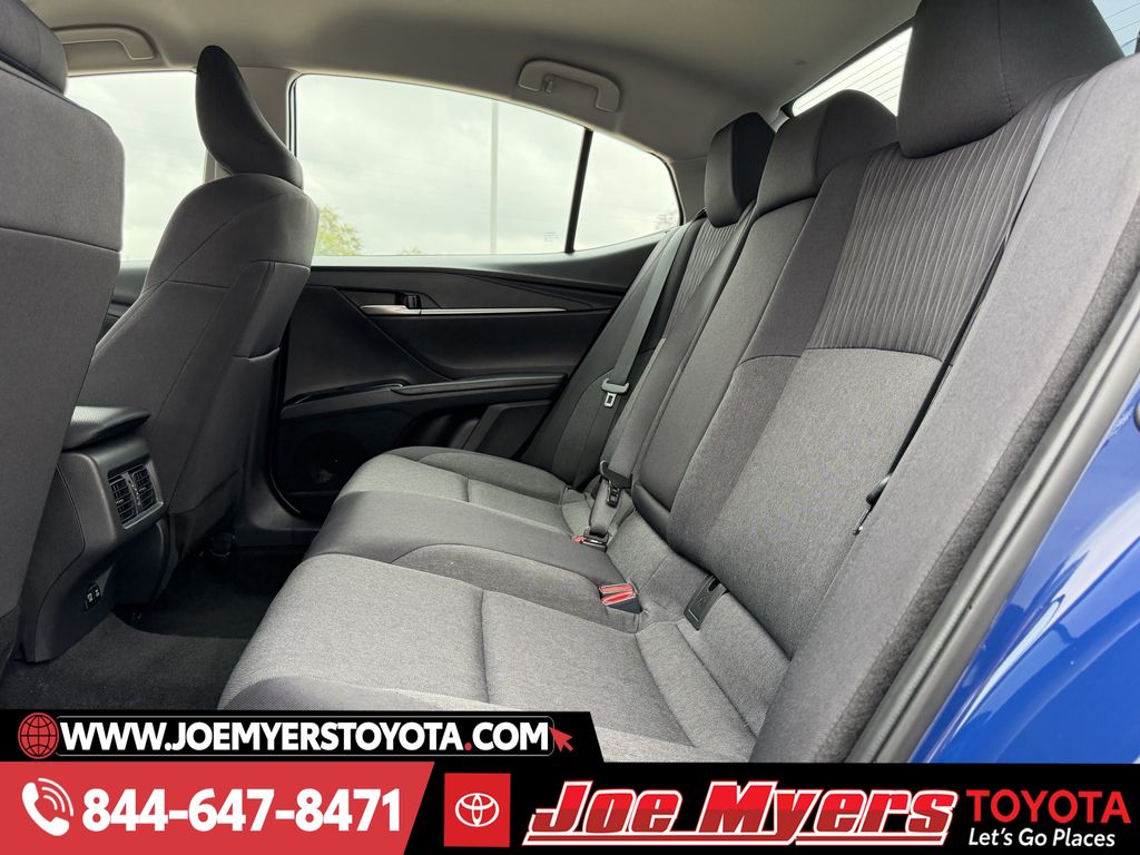 Used 2025 Reservoir Blue Toyota LE image 27