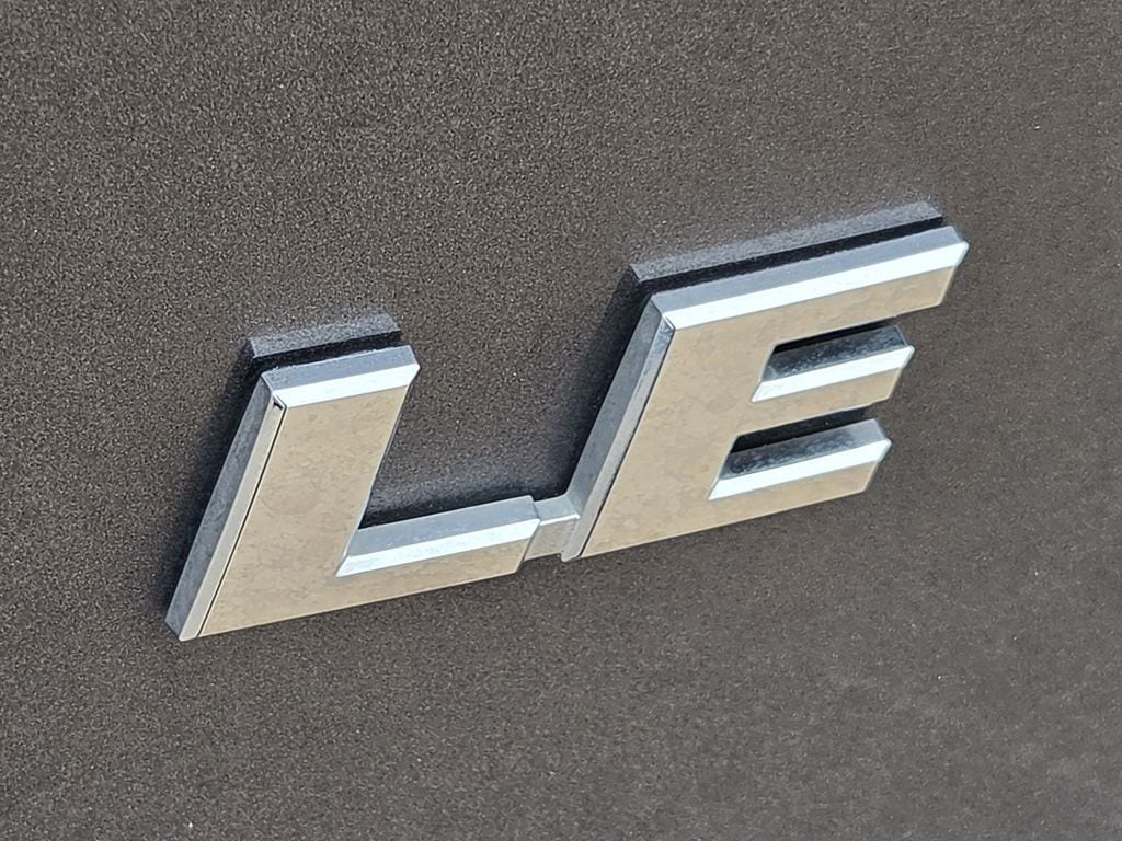 Used 2025 Magnetic Gray Metallic Toyota LE image 11