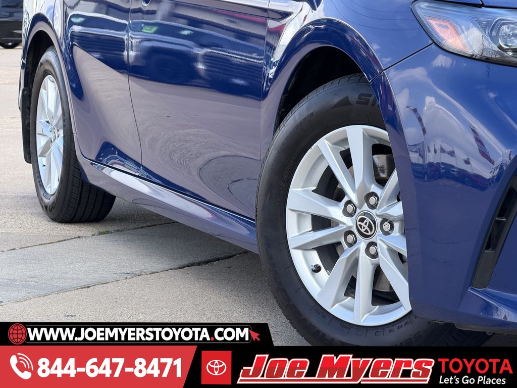 Used 2025 Reservoir Blue Toyota LE image 12