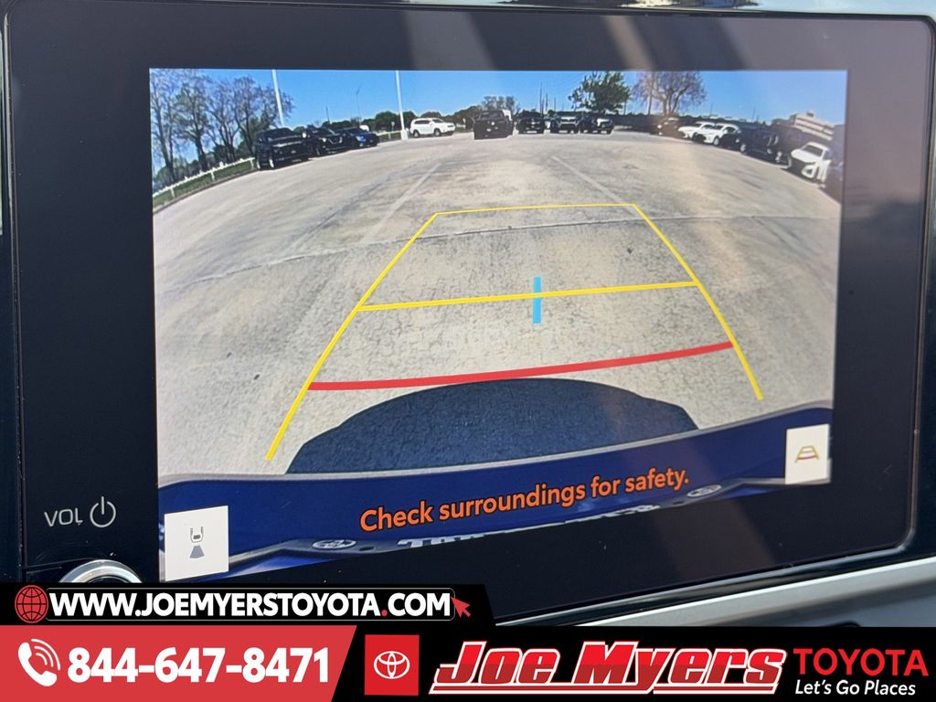 Used 2025 Reservoir Blue Toyota LE image 19