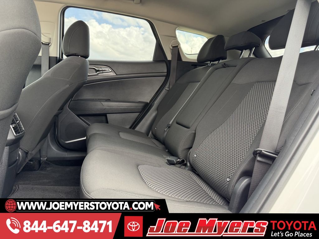 Used 2025 Snow White Pearl Kia LX image 28