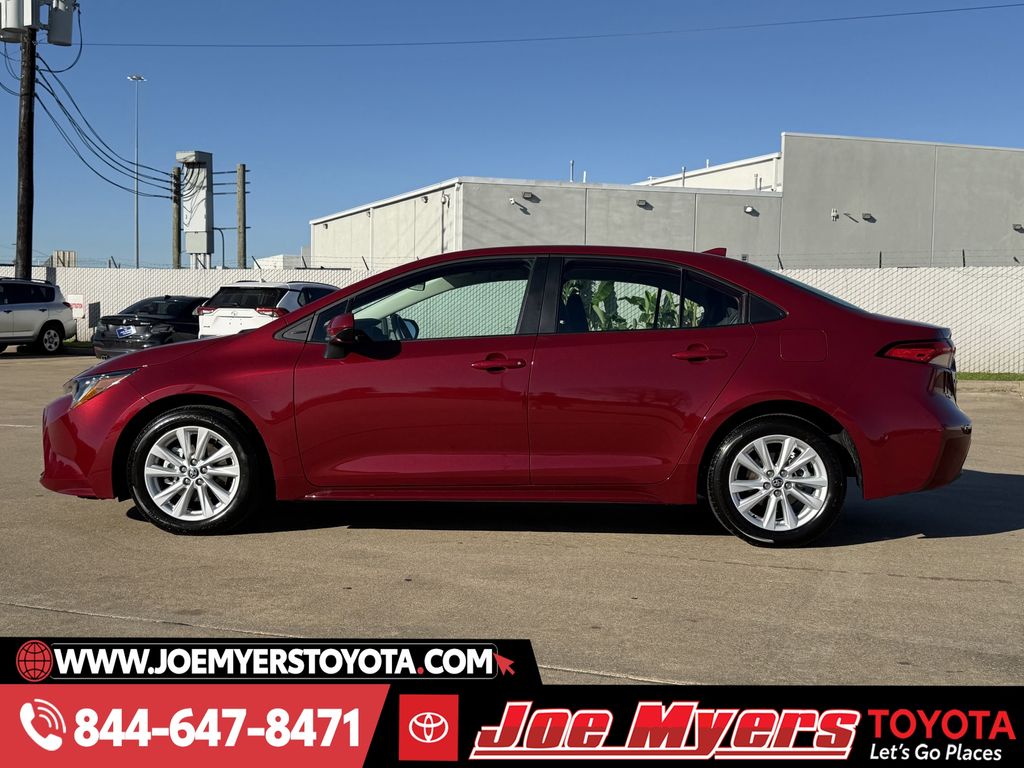 Certified Used 2026 Ruby Flare Pearl Toyota LE image 6