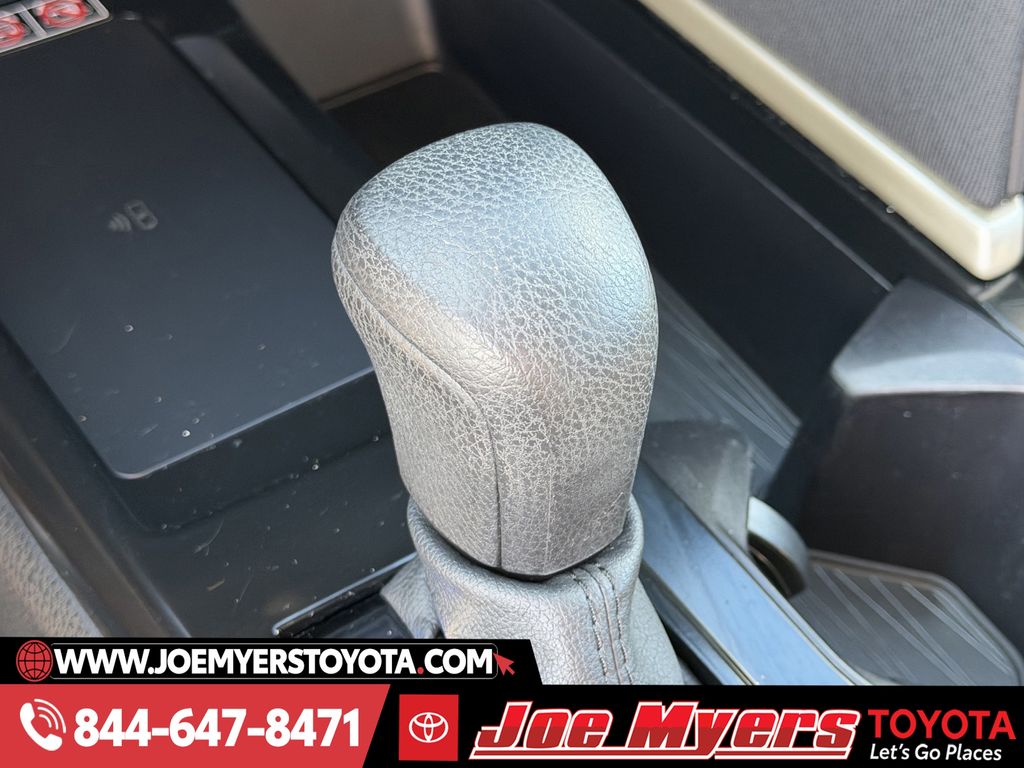 Used 2025 Reservoir Blue Toyota LE image 21