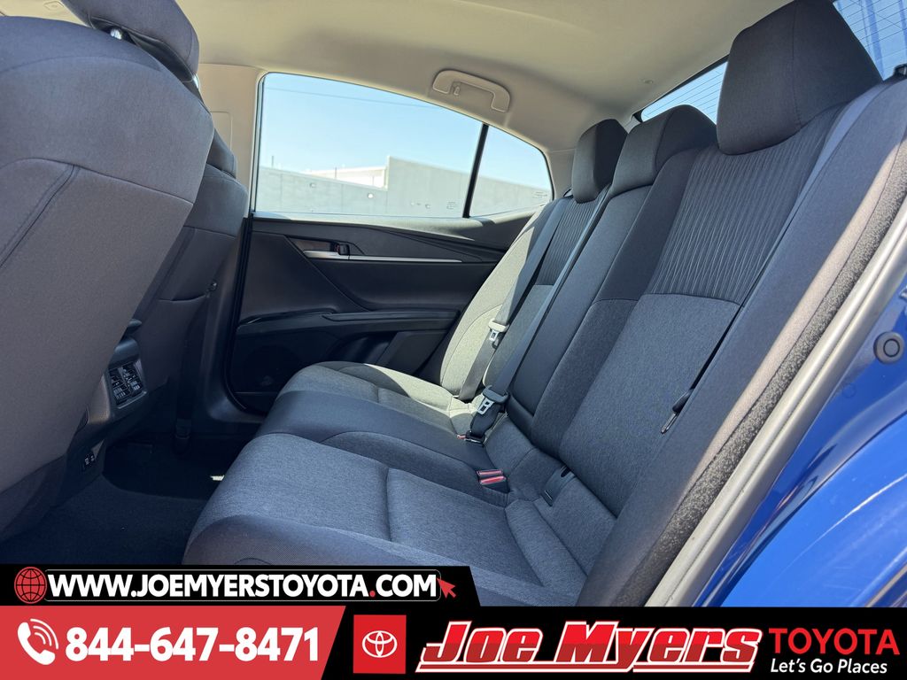 Used 2025 Reservoir Blue Toyota LE image 28