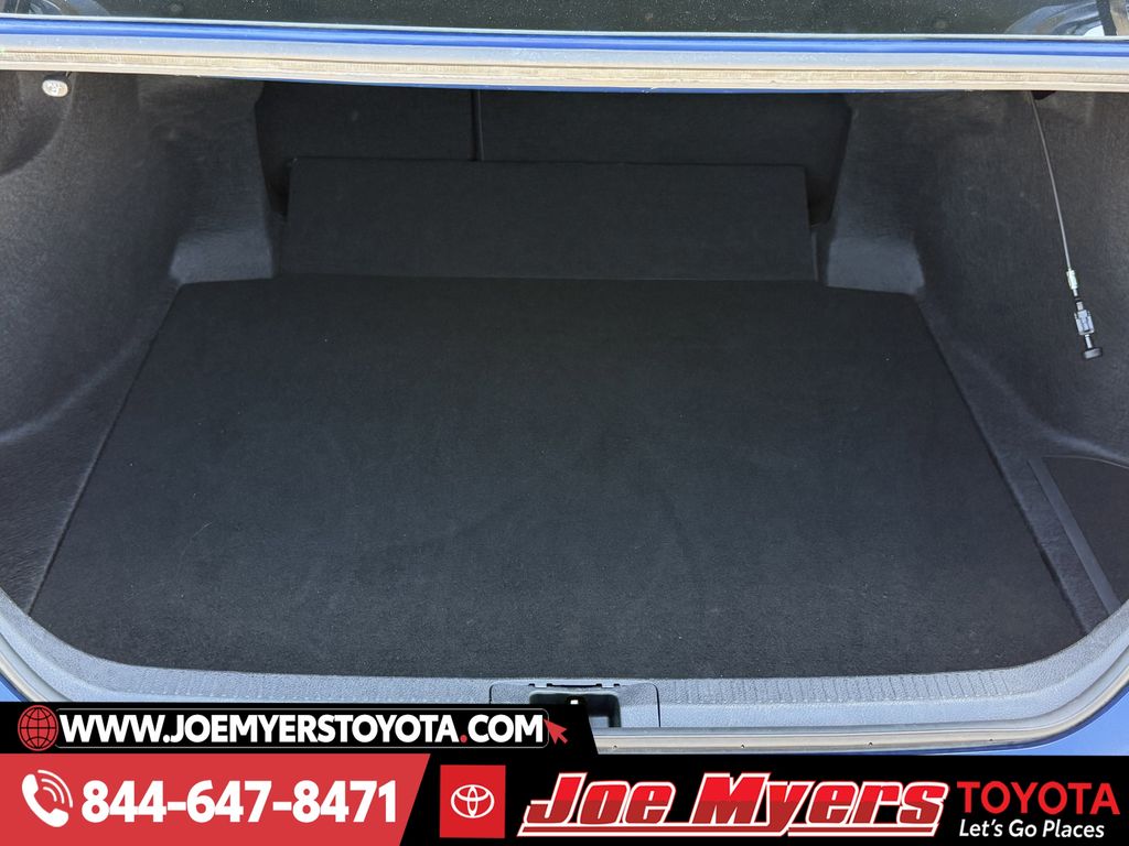 Used 2025 Reservoir Blue Toyota LE image 29