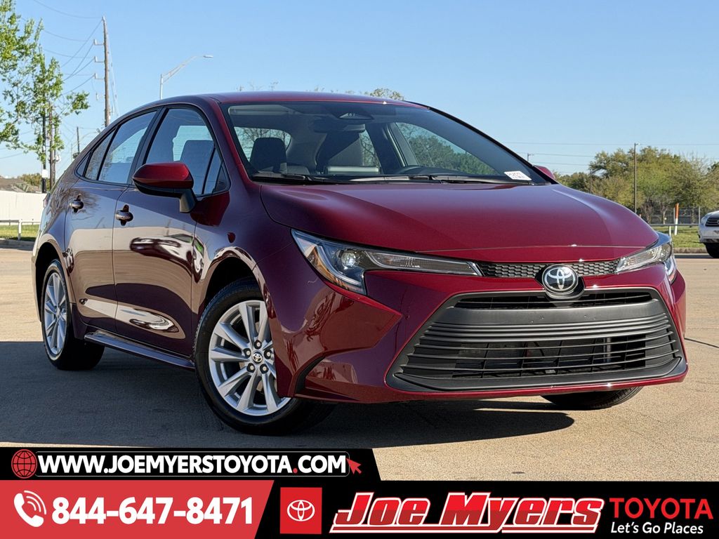 Certified Used 2026 Ruby Flare Pearl Toyota LE image 2