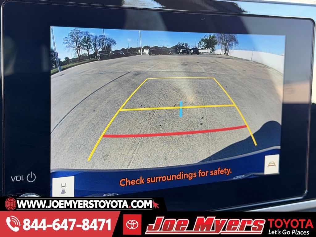 Used 2025 Reservoir Blue Toyota LE image 19