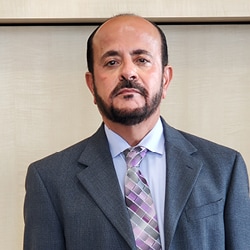 Staff member Mike Khan from ID_e9f3a8f4ef33