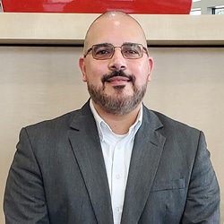 Staff member Alex Sanchez from ID_4d1557026b29