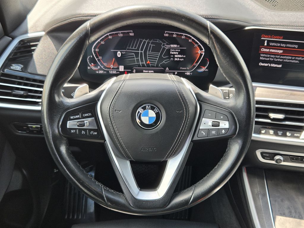 Used 2023 Black Sapphire Metallic BMW sDrive40i image 14