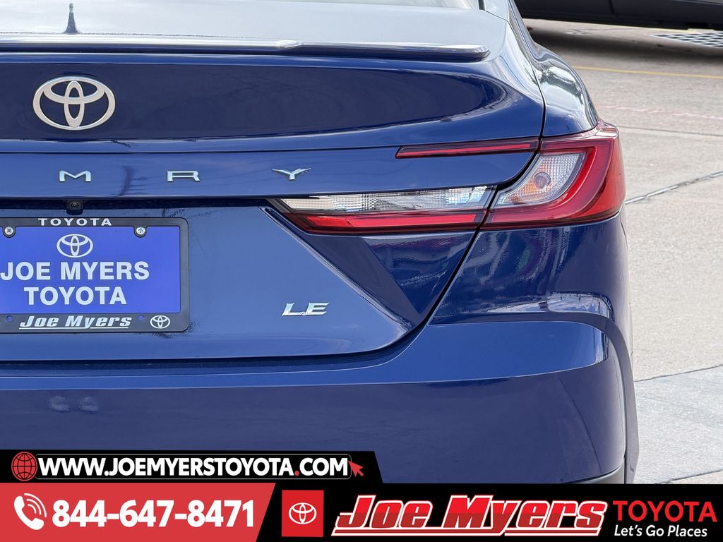 Used 2025 Reservoir Blue Toyota LE image 9