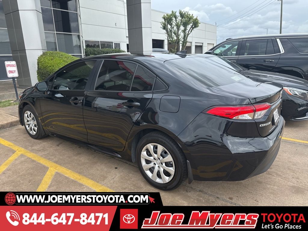 Used 2025 Midnight Black Metallic Toyota LE image 4