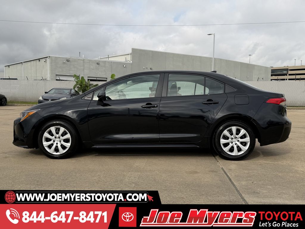 Used 2025 Midnight Black Metallic Toyota LE image 6