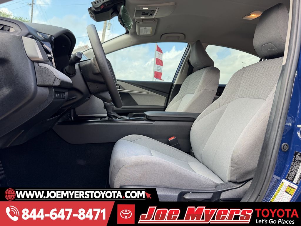 Used 2025 Reservoir Blue Toyota LE image 27