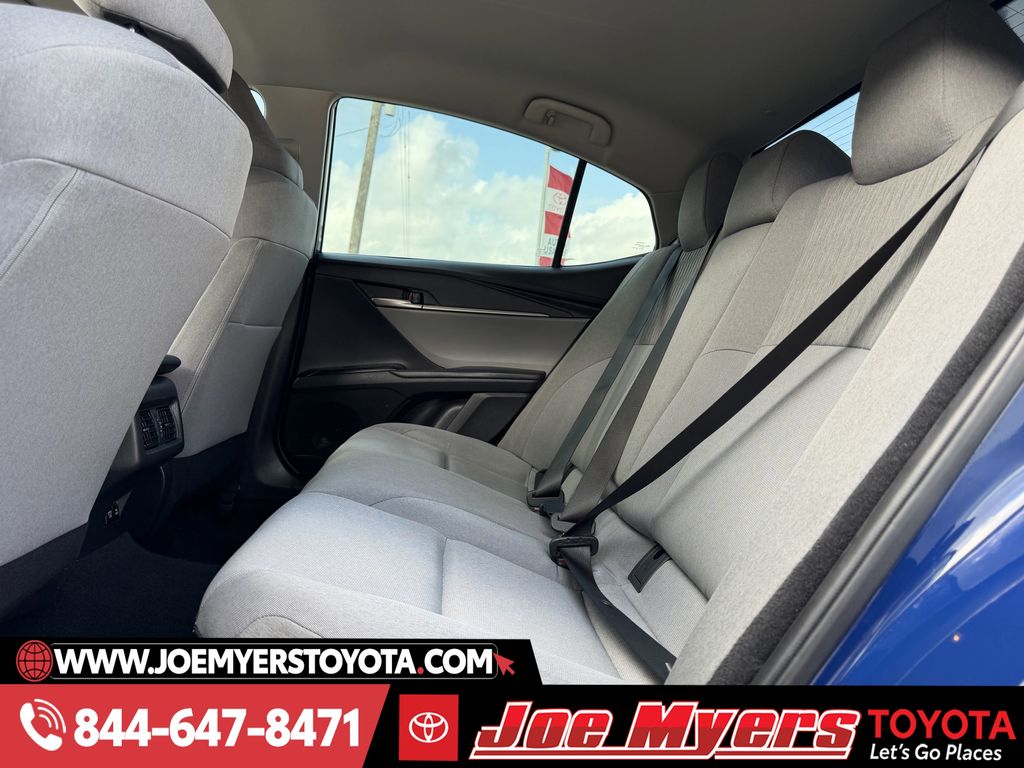 Used 2025 Reservoir Blue Toyota LE image 28