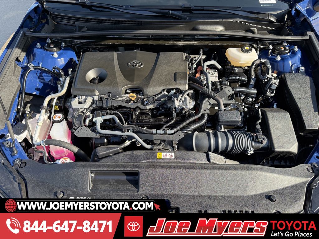 Used 2025 Reservoir Blue Toyota LE image 30