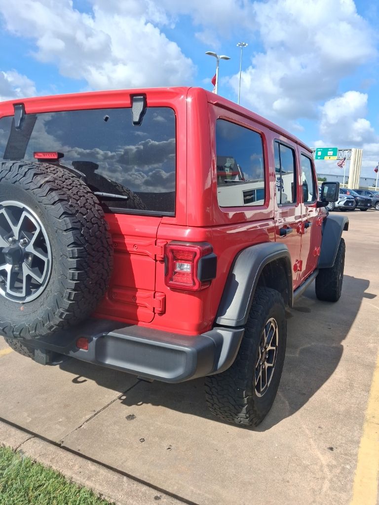 Used 2025 Firecracker Red Clearcoat Jeep Rubicon image 3
