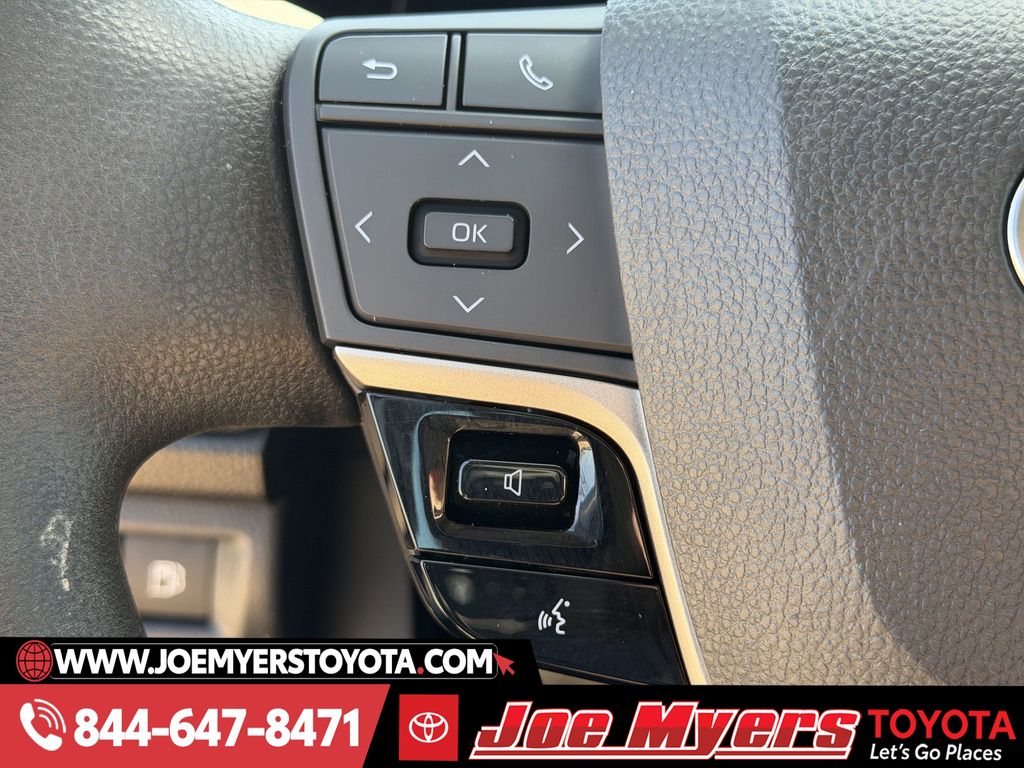 Used 2025 Reservoir Blue Toyota LE image 24
