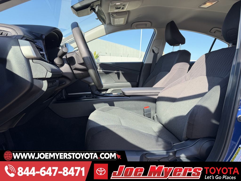 Used 2025 Reservoir Blue Toyota LE image 27