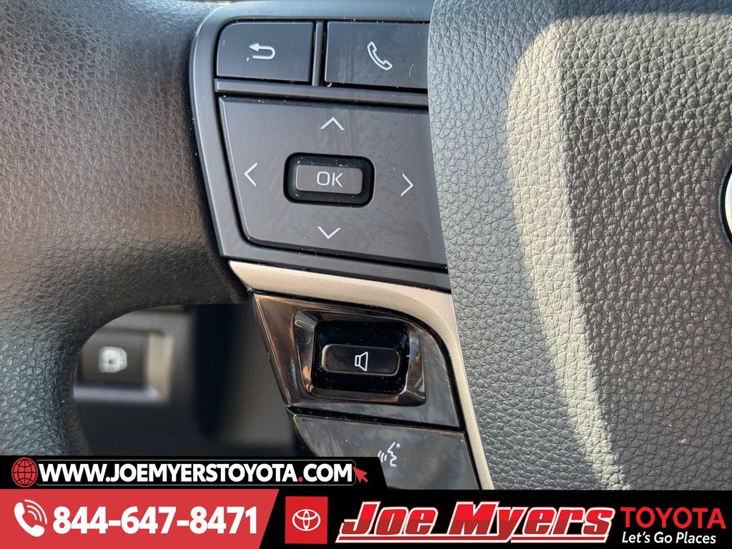 Used 2025 Reservoir Blue Toyota LE image 24