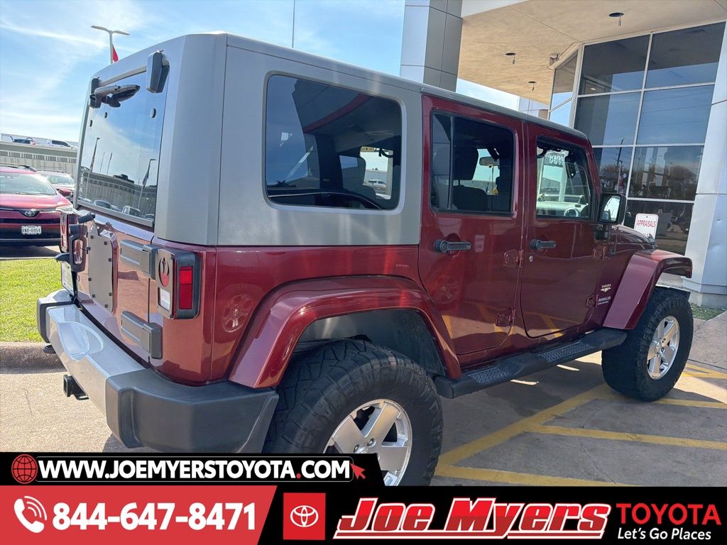 Used 2009 Red Rock Crystal Pearlcoat Jeep Unlimited Sahara image 3