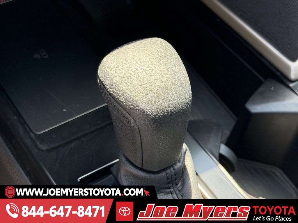 Used 2025 Reservoir Blue Toyota LE image 21