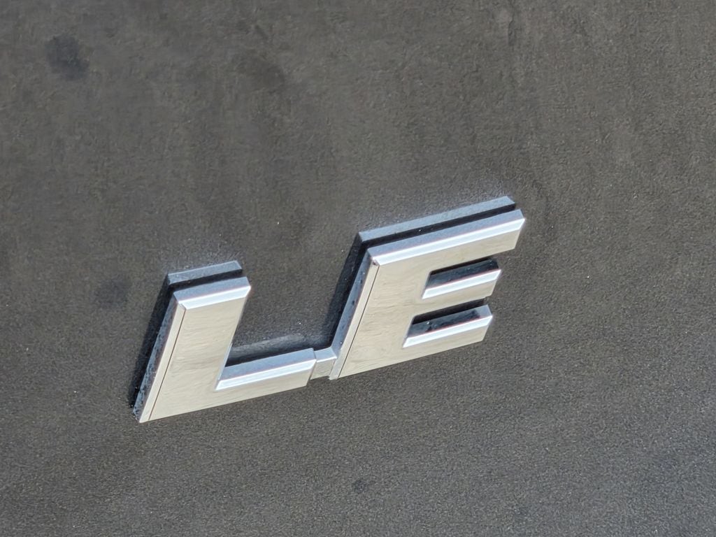 Used 2025 Magnetic Gray Metallic Toyota LE image 11