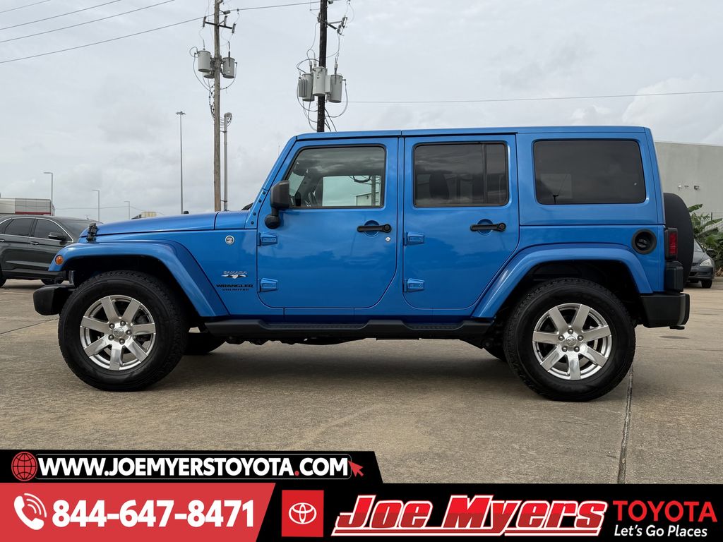 Used 2016 Hydro Blue Pearl Coat Jeep Unlimited Sahara image 6
