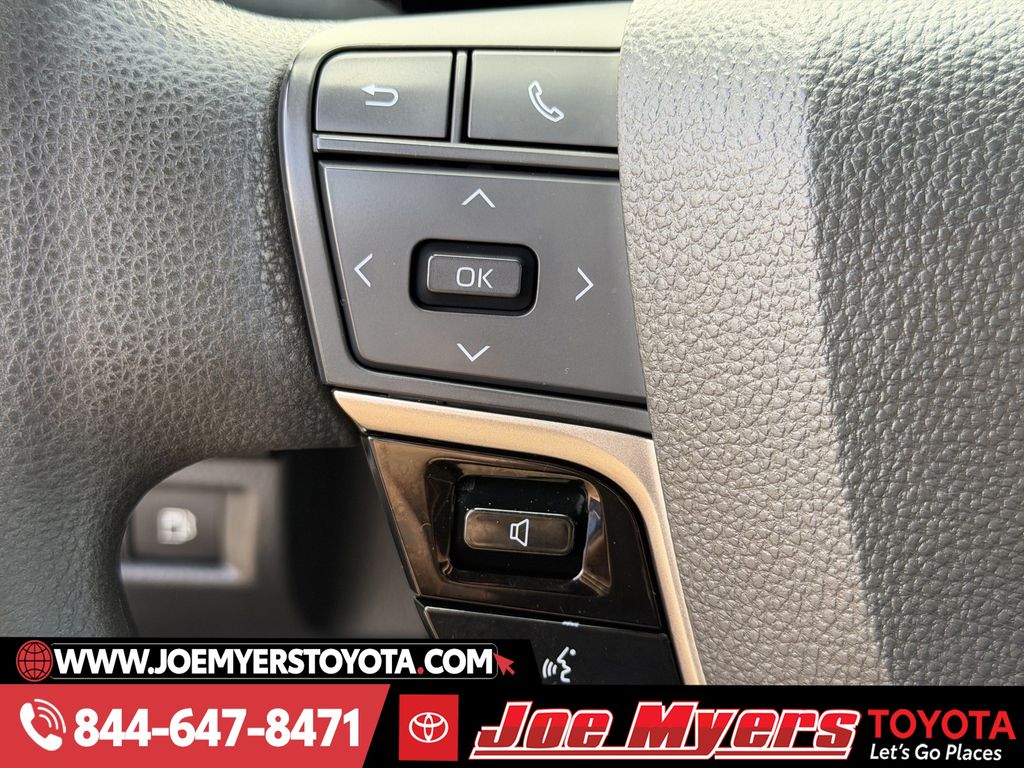 Used 2025 Reservoir Blue Toyota LE image 24