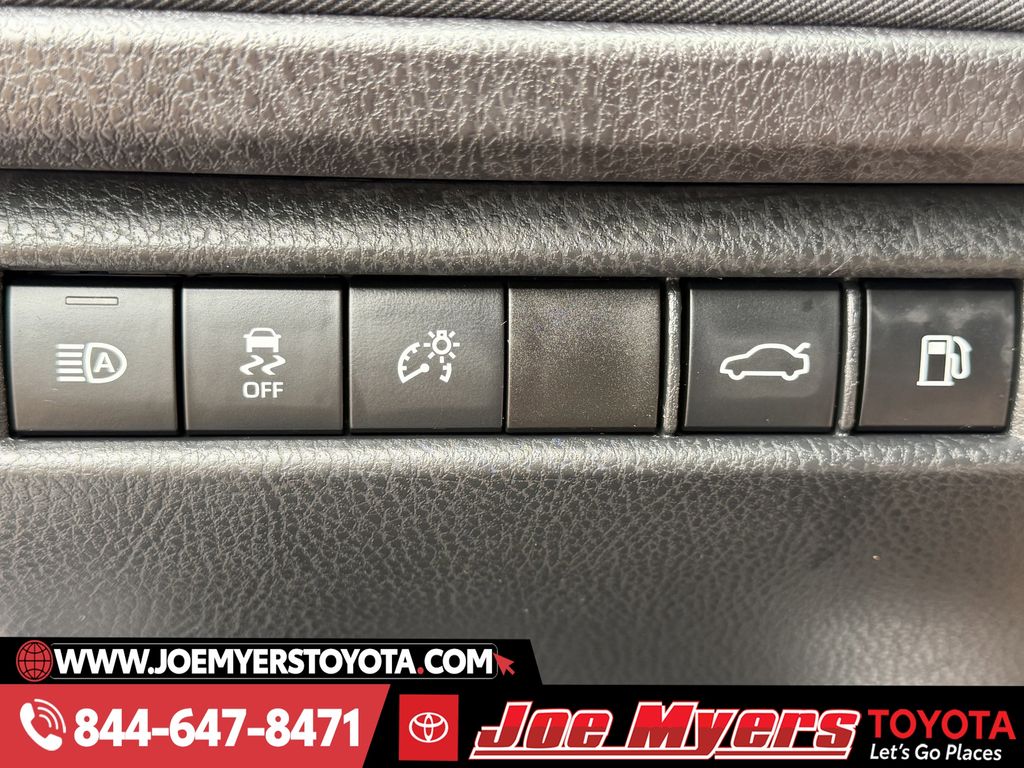 Used 2025 Reservoir Blue Toyota LE image 24