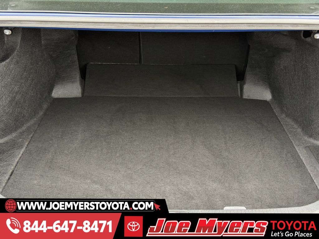 Used 2025 Reservoir Blue Toyota LE image 28