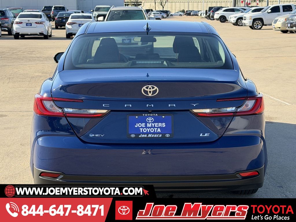 Used 2025 Reservoir Blue Toyota LE image 8