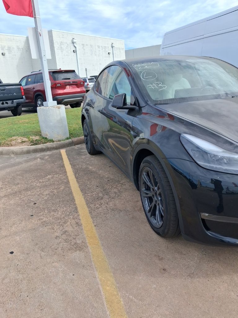 Used 2025 Tesla Model Y Long Range with VIN 7SAYGDEE1SF280495 for sale in Houston, TX