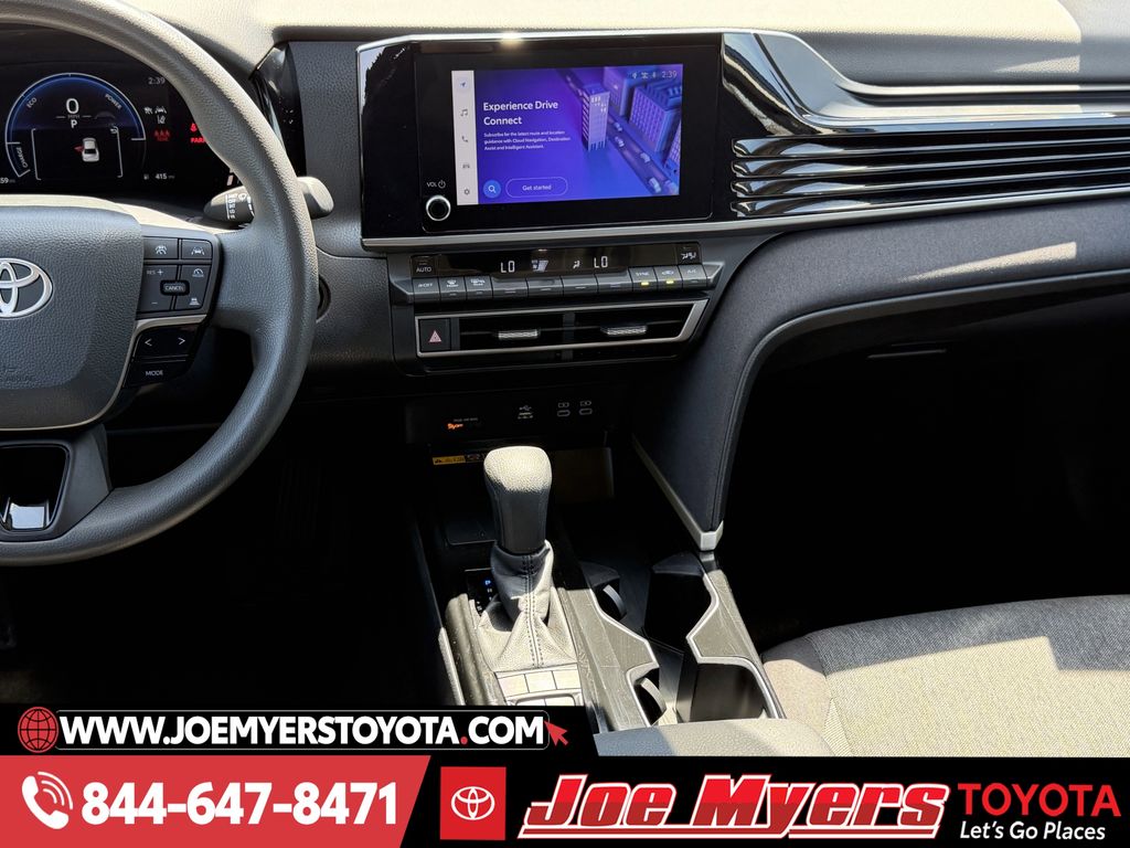 Used 2025 Reservoir Blue Toyota LE image 17