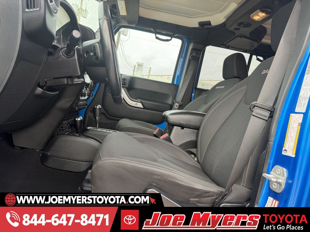 Used 2016 Hydro Blue Pearl Coat Jeep Unlimited Sahara image 25