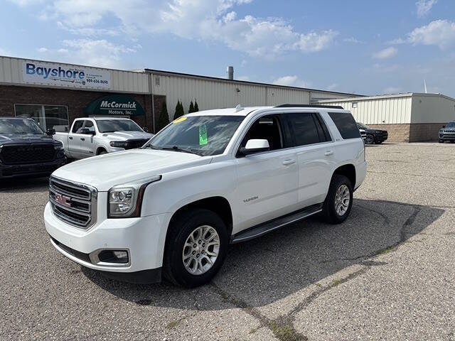 Used 2015 GMC Yukon SLE with VIN 1GKS2AKC1FR507899 for sale in Pigeon, MI